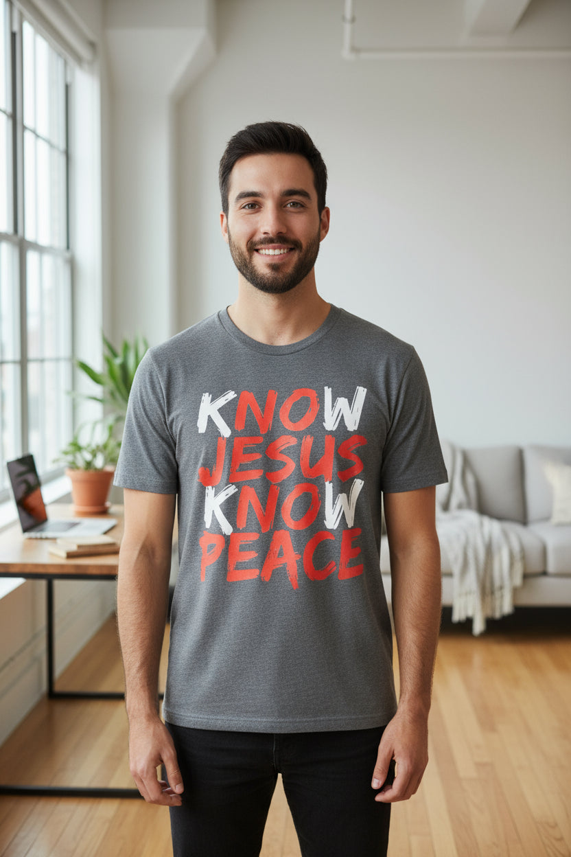 Gray t-shirt with red and white text 'KNOW JESUS KNOW PEACE' on a light gray background